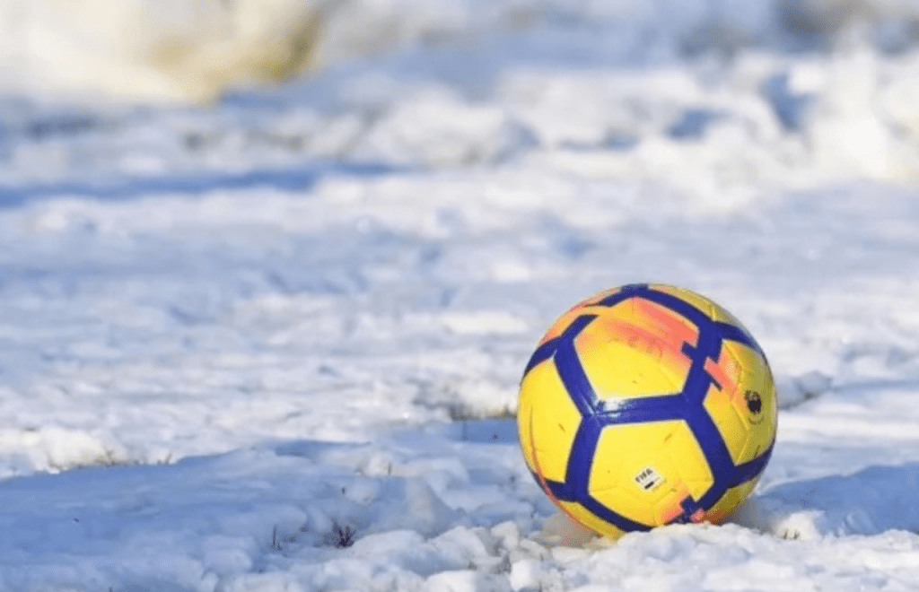 Staying warm coaching kids football